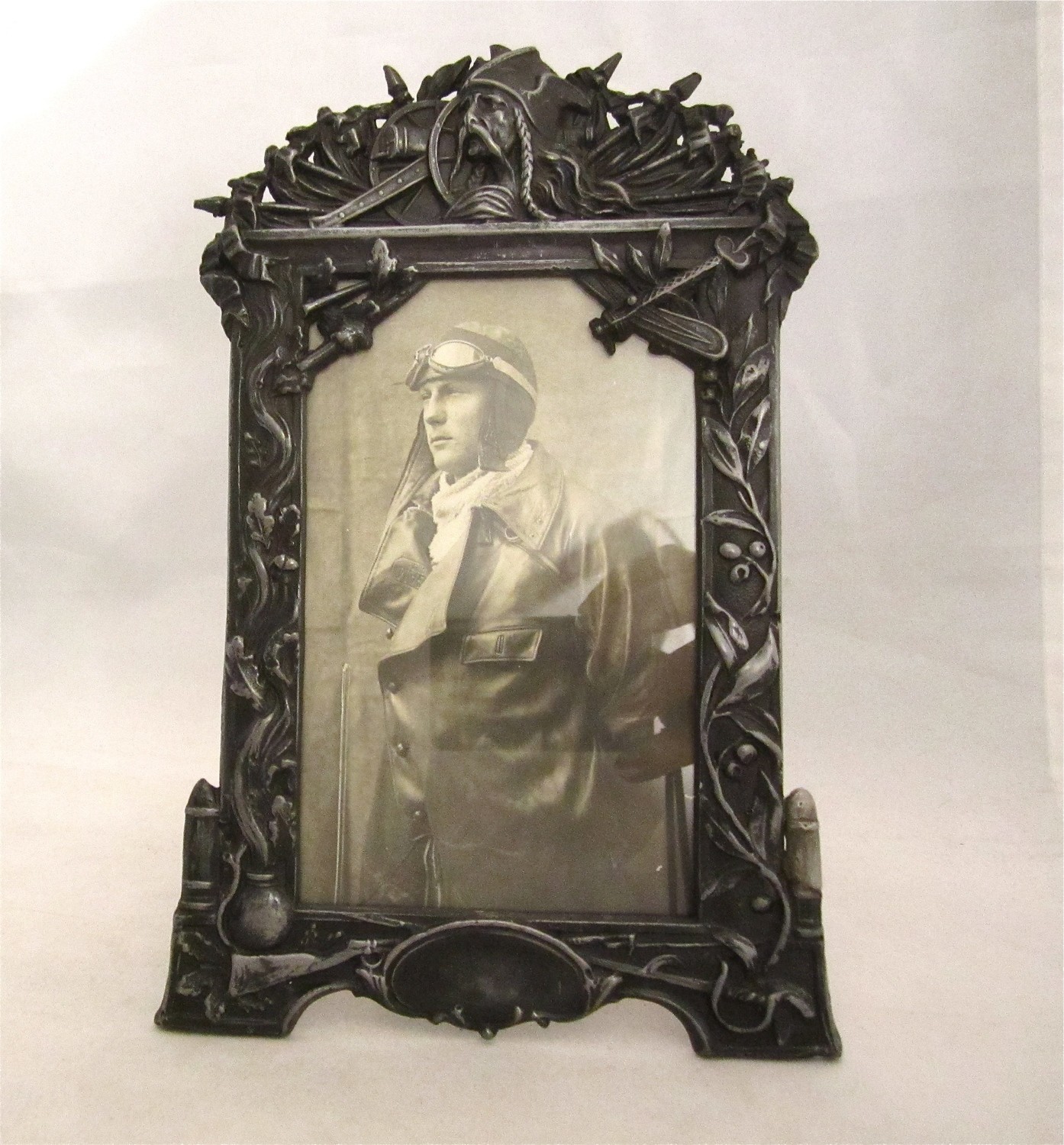 Original Photo frame in iron antique with photo of aviator, decorated with airplane pilot around 1914, vintage ,old , World War 1, WWI 