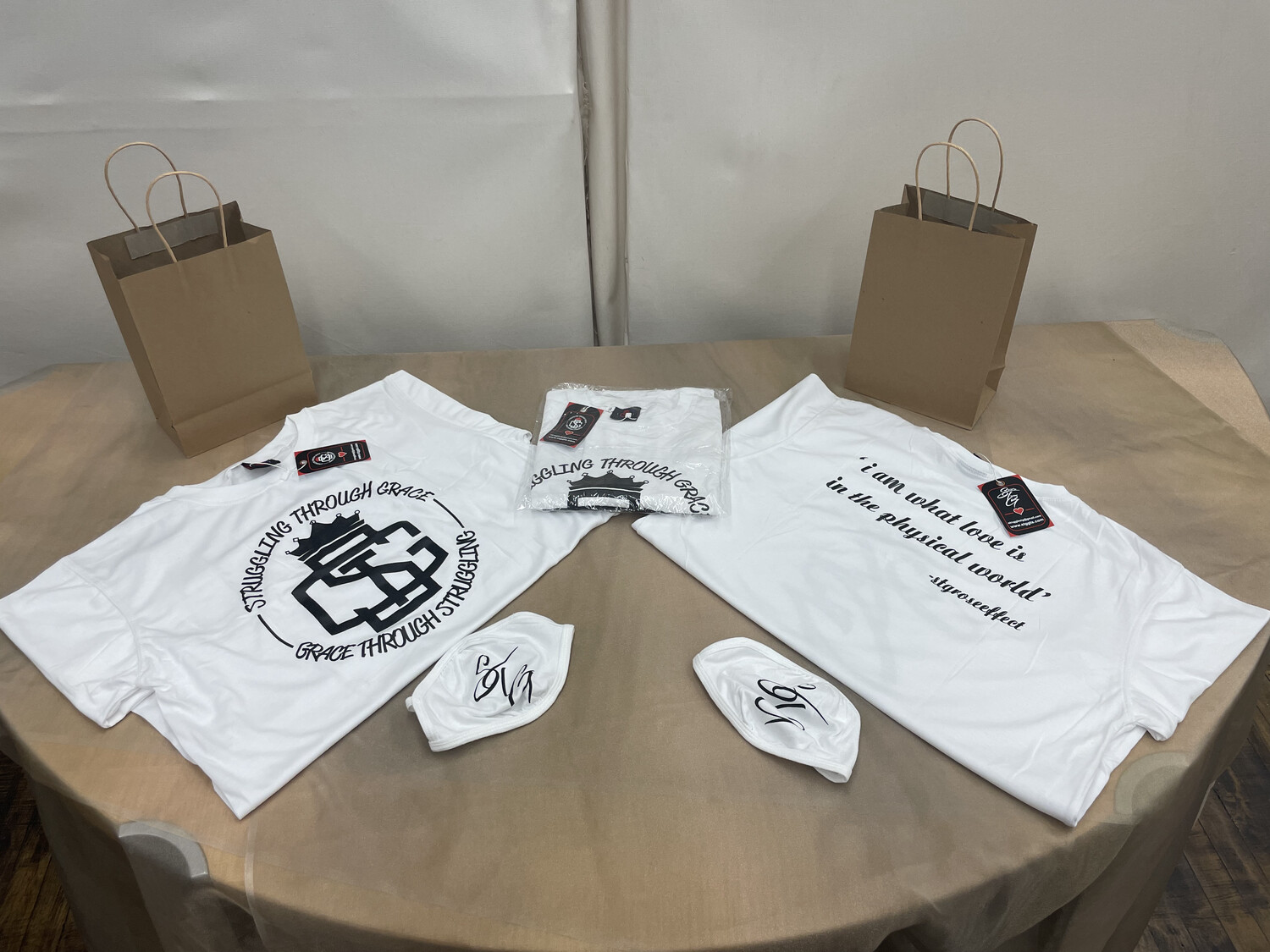 STG Logo (White with black lettering