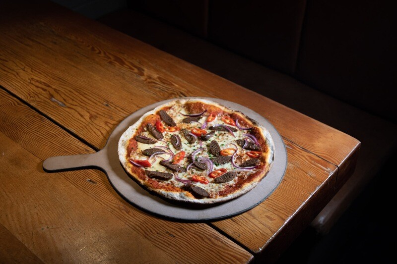 Spicy Merguez Sausage Pizza