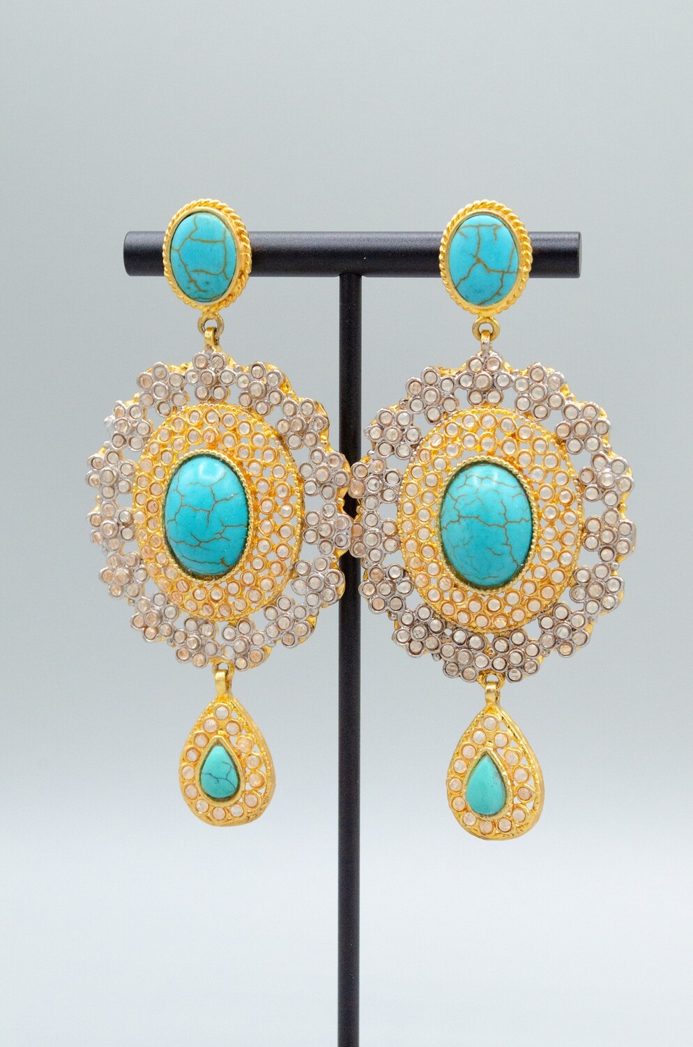 Golden Earrings with Berylline colored stone
