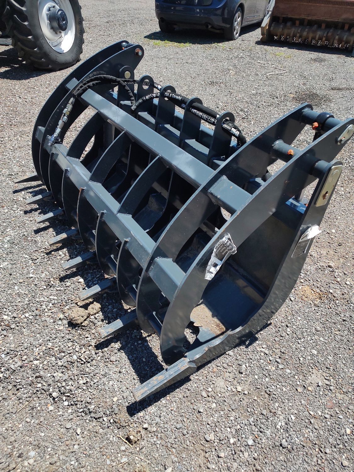 2023 HD TMG 72" Skid Steer HYD. Clam Shell Root Grapple Attachment