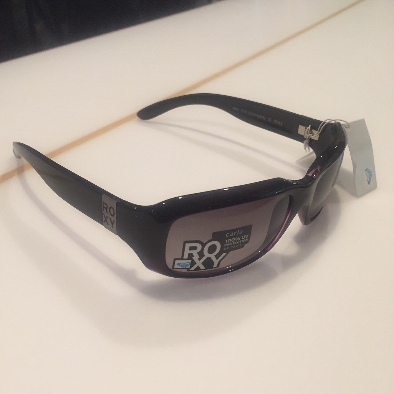 black aviator sunglasses with gold trim