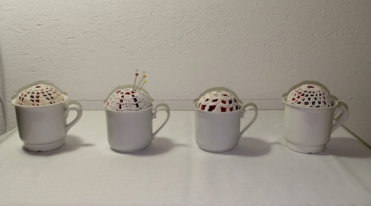 Speldenkussen kopje ruitjes