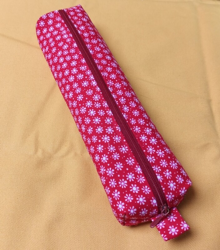 Kleine pennenzak rood