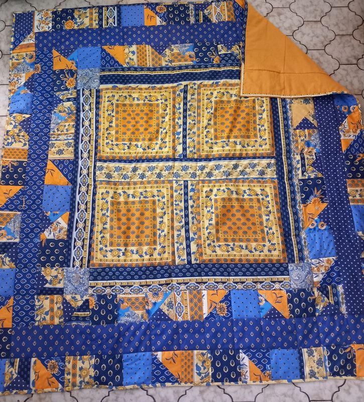 Geel blauwe quilt