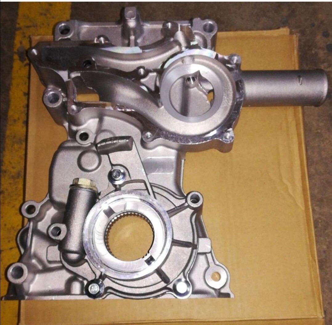 21R timing cover with oil pump