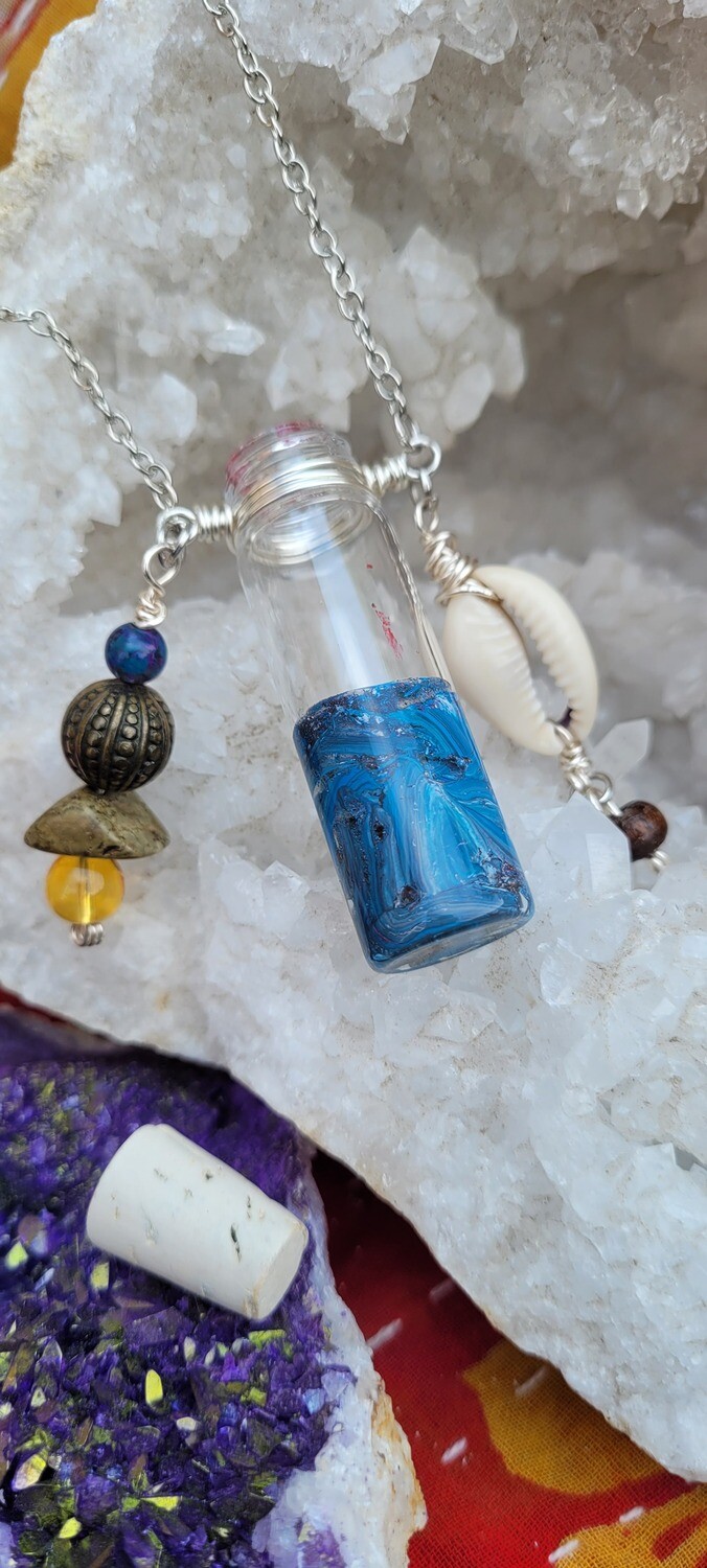 Vintage Vial Necklace featuring Cowrie Shell, Upcycled Beads, Charms, and Painted Glass Vial