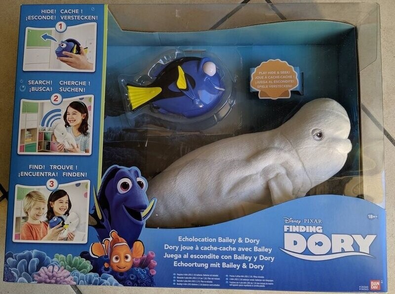 Dory le Poisson joue à Cache-Cache avec Bailey la Baleine Blanche, l'enfant cache Dory le Placard et Bailey Emmètre des Sons de Reconnaissances.