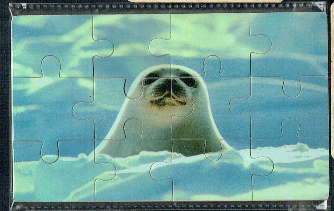 Puzzle en Bois, "Le Phoque blanc", 12 Pièces En Bois, avec une Épaisseur de 3mm, un Jeu en Bois pour éveiller les petits...