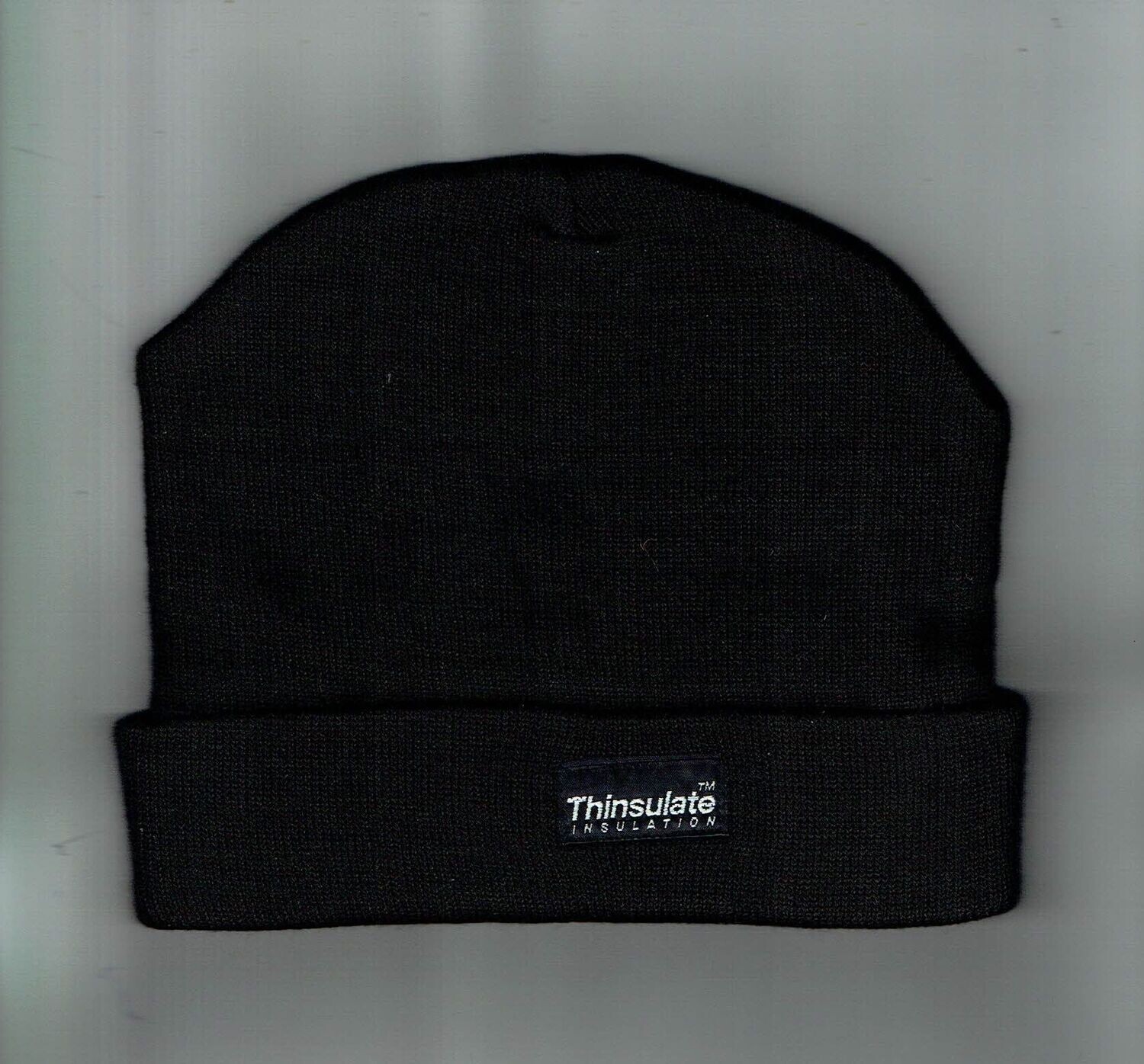 Un Bonnet de Couleur "Noir" avec un Revers et un Logo "Thinsulade Insulation", pour Taille unique.