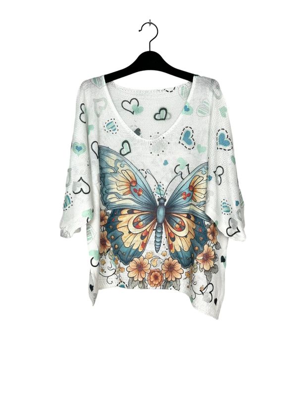 Tunique "Fantaisie" - Un Papillon Bleu/Orange entouré de Fleurs et de Cœurs sur un Fond Blanc/Crème