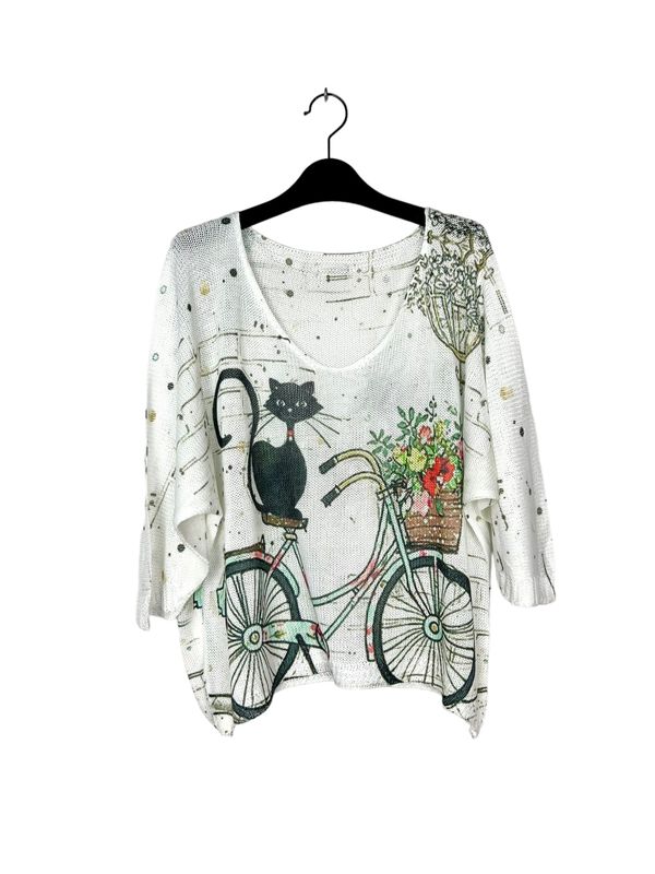 Tunique "Fantaisie" - Un Chat Noir Assis sur sa Bicyclette avec un Panier de Fleurs et sur un Fond Blanc/Crème
