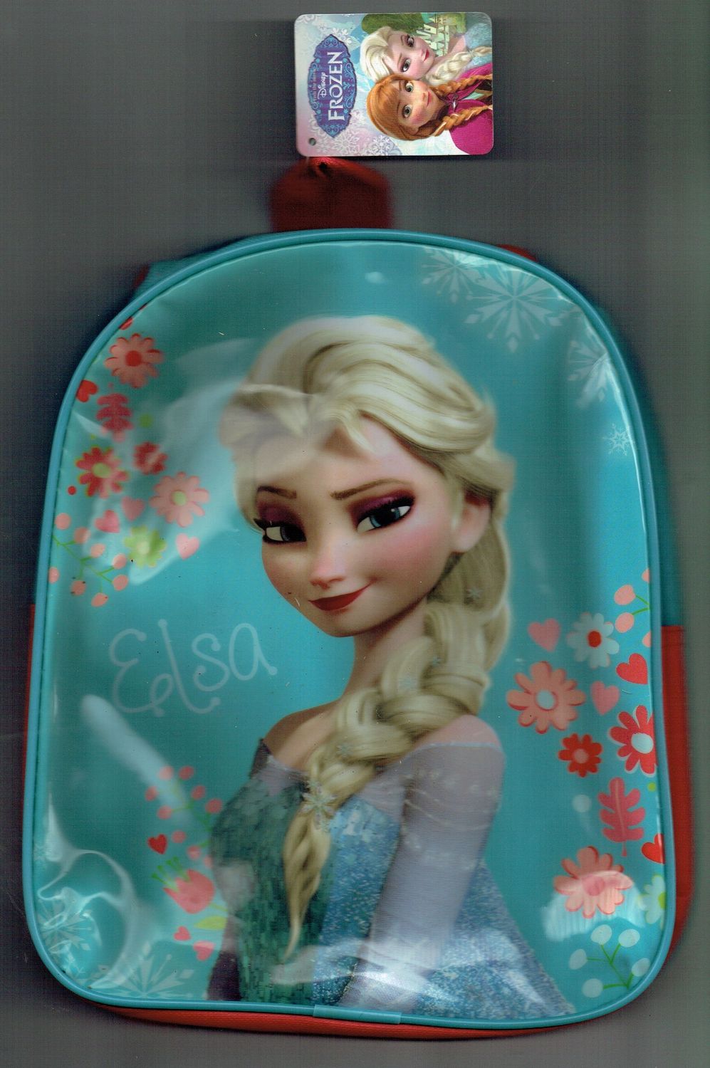 Sac à Dos Enfant, "Portrait Elsa Frozen"De Couleur Bleu, Lanière Rouge, pour une Dimension de 27x22x8 cm.