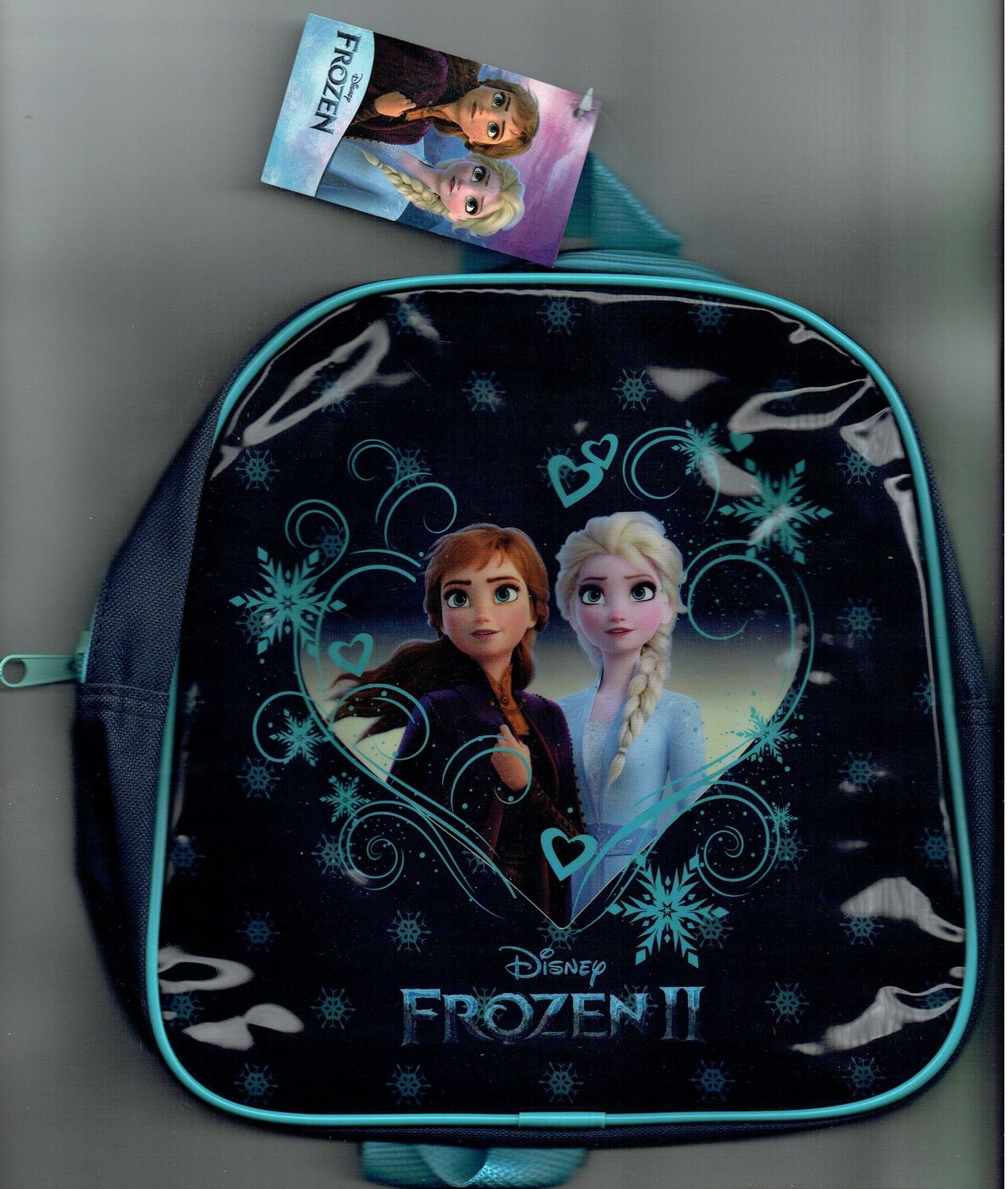 Sac à dos Enfant, "Deux Portrait Elsa Frozen II", De Couleur Bleu Marine, Lanière Bleu, pour une Dimension de 24x22x6 cm.