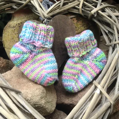 Hand-knitted first socks keep little feet warm
