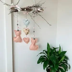 Lovingly handcrafted branch hanger in rose and grey with fabric cats, hearts and wooden beads – decoratively attached to thre