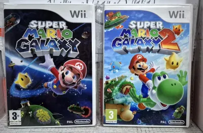 Bundle Super Mario Galaxy 1 + 2 - Nintendo Wii Prime Stampe EU Con Italiano Bundle Super Mario Galaxy 1 + 2 - Nintendo Wii Prime Stampe EU Con Italiano