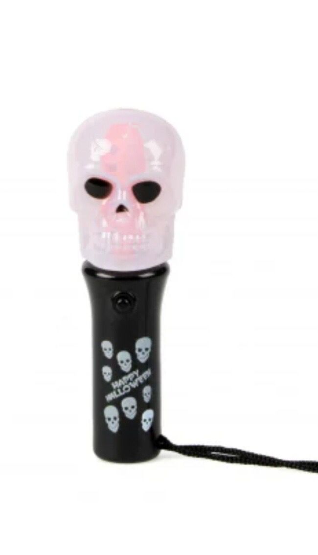 Torche spinner lumineux tête de mort Halloween 