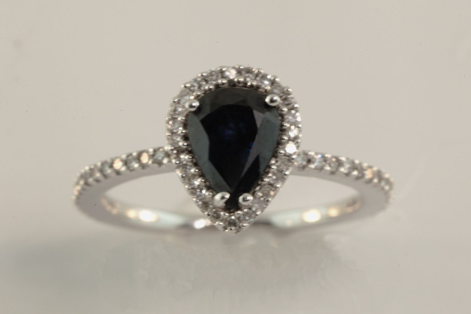 Sapphire and diamond fashion ring.