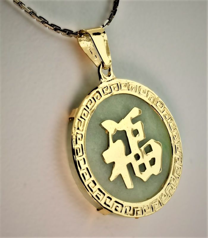 Jade and 14K yellow gold penant
