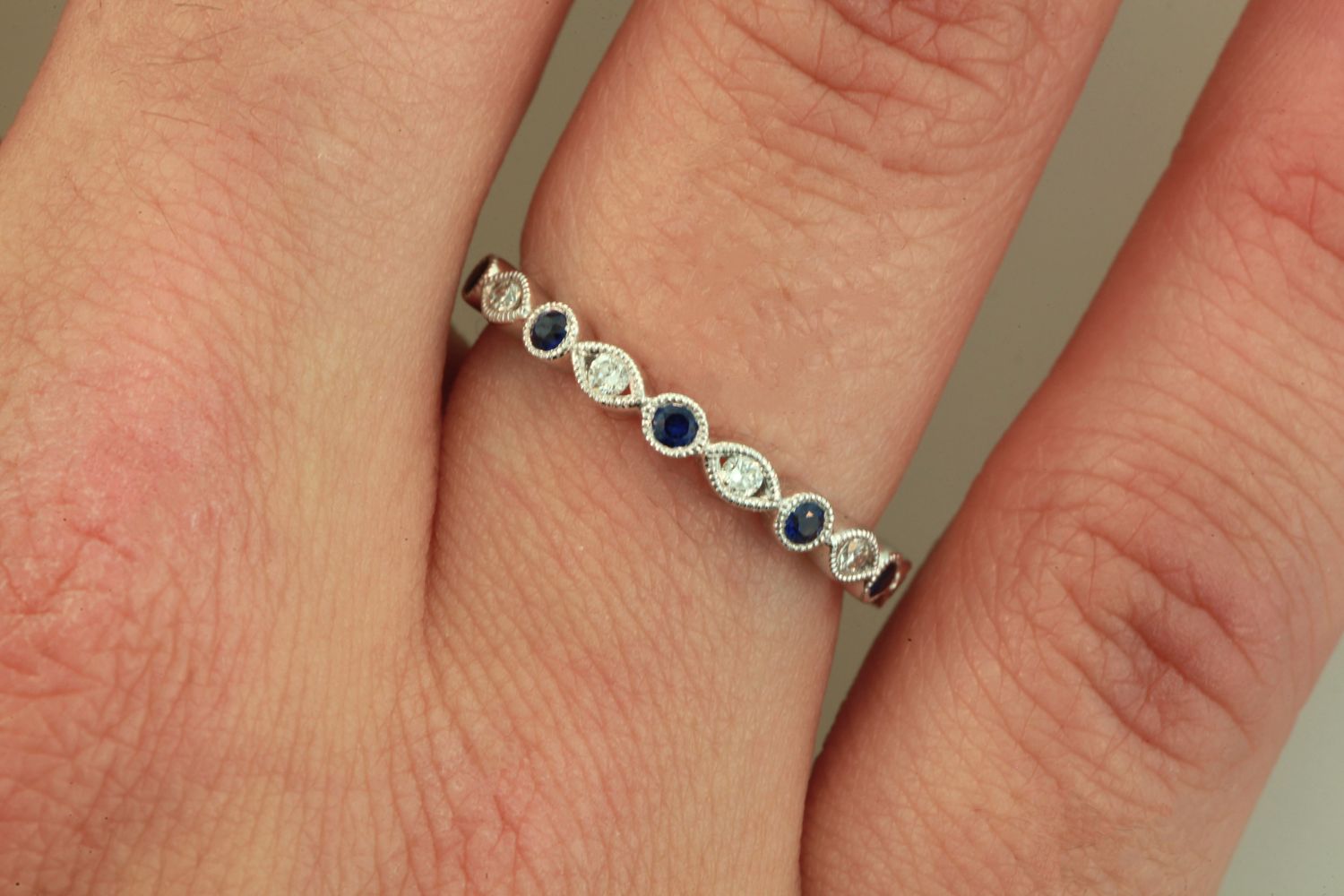 Sapphire and diamond fashion ring.