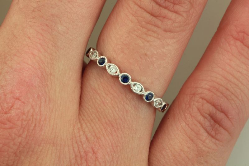 Sapphire and diamond fashion ring.