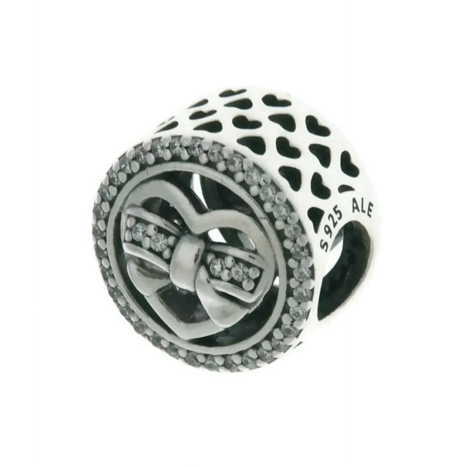 Heart charm in SS with clear CZ in bow detail and cut-out heart pattern