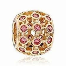 PANDORA Charm in 14k gold with 30 bezel-set fancy pink CZ
