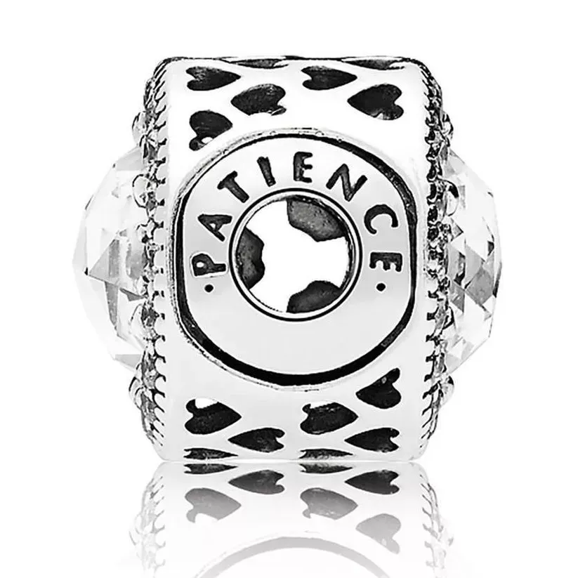 PANDORA - ESSENCE charm in SS with clear CZ and cut-out heart details