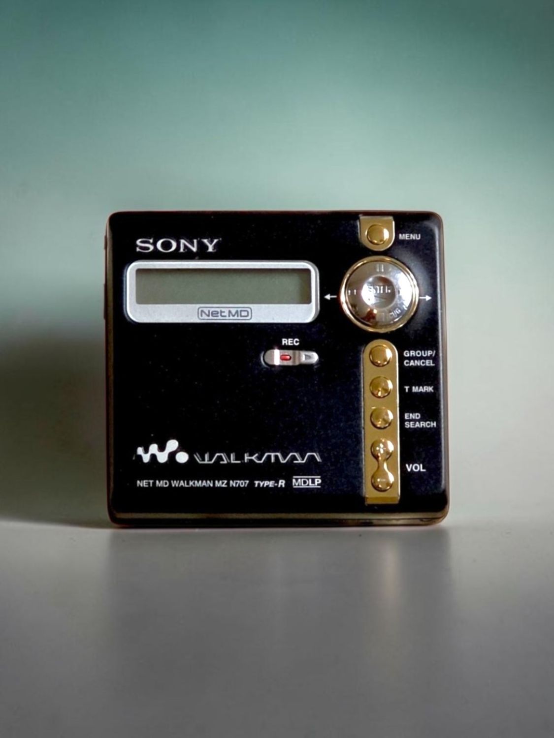 Recoloured Black Sony MZ-N707 with Gold Stripe