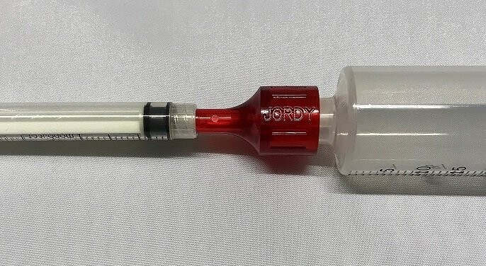 Jordy Toomey to Luer Adapter with Cap