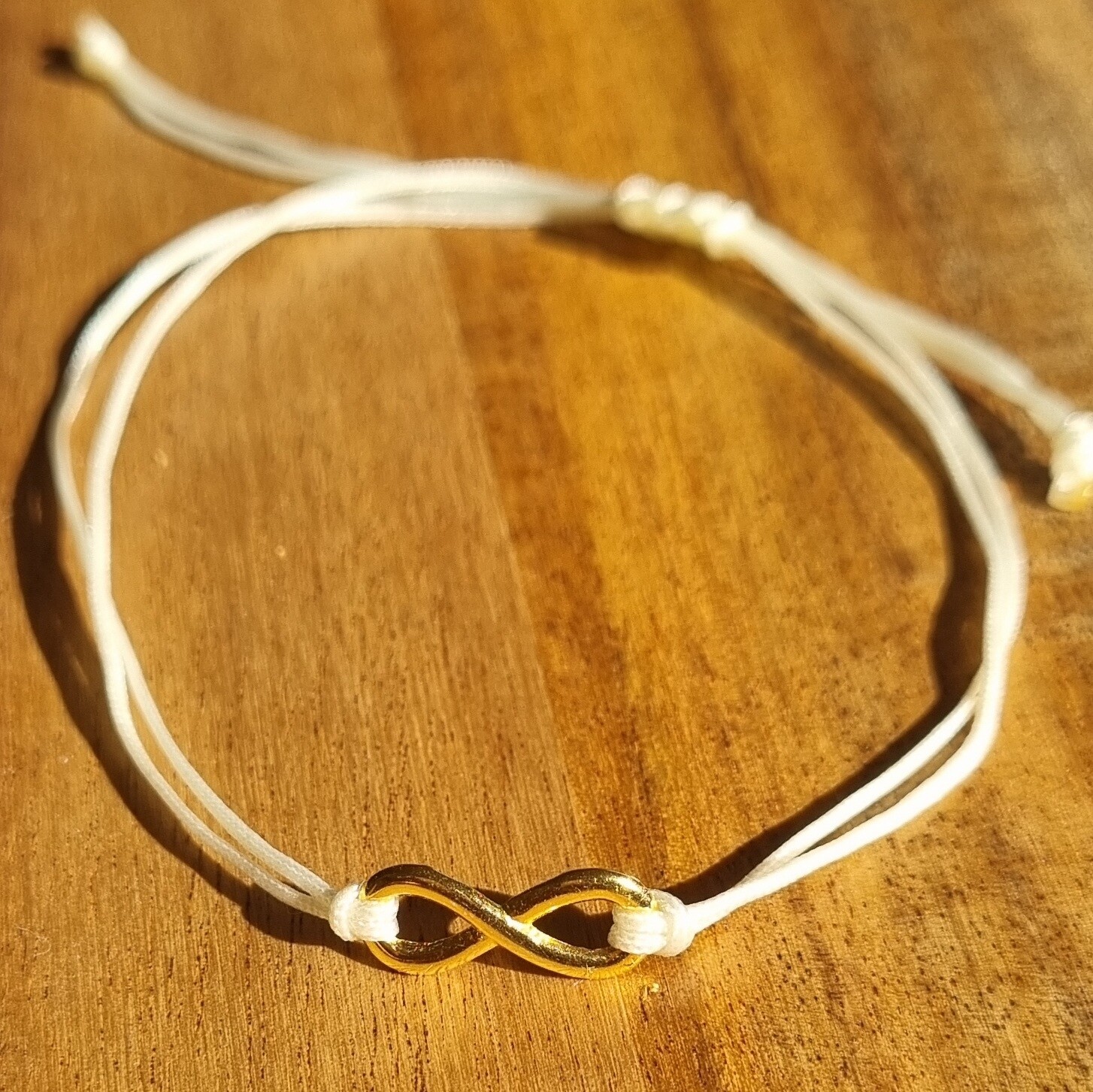Zartes Armband Infinity vergoldet, Farbauswahl