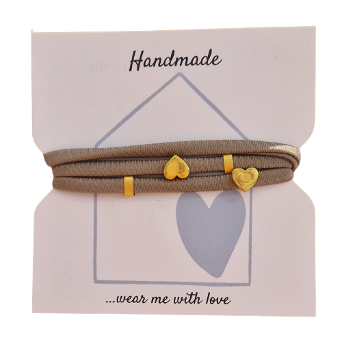 Wickelarmband hazel naturbraun mit zwei Herz Schiebeperlen und zwei ovalen Tubes gold