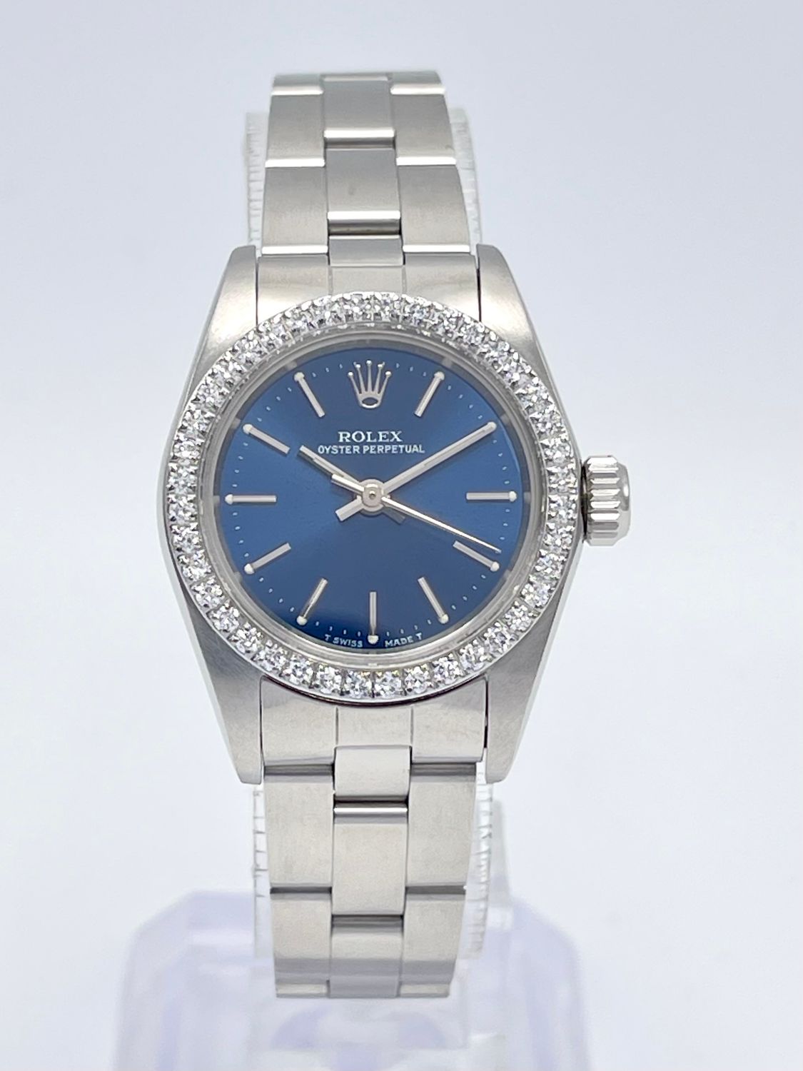 Rolex Oyster Perpetual 67230 24mm Blue Dial Diamond Bezel Box Watch Ladies