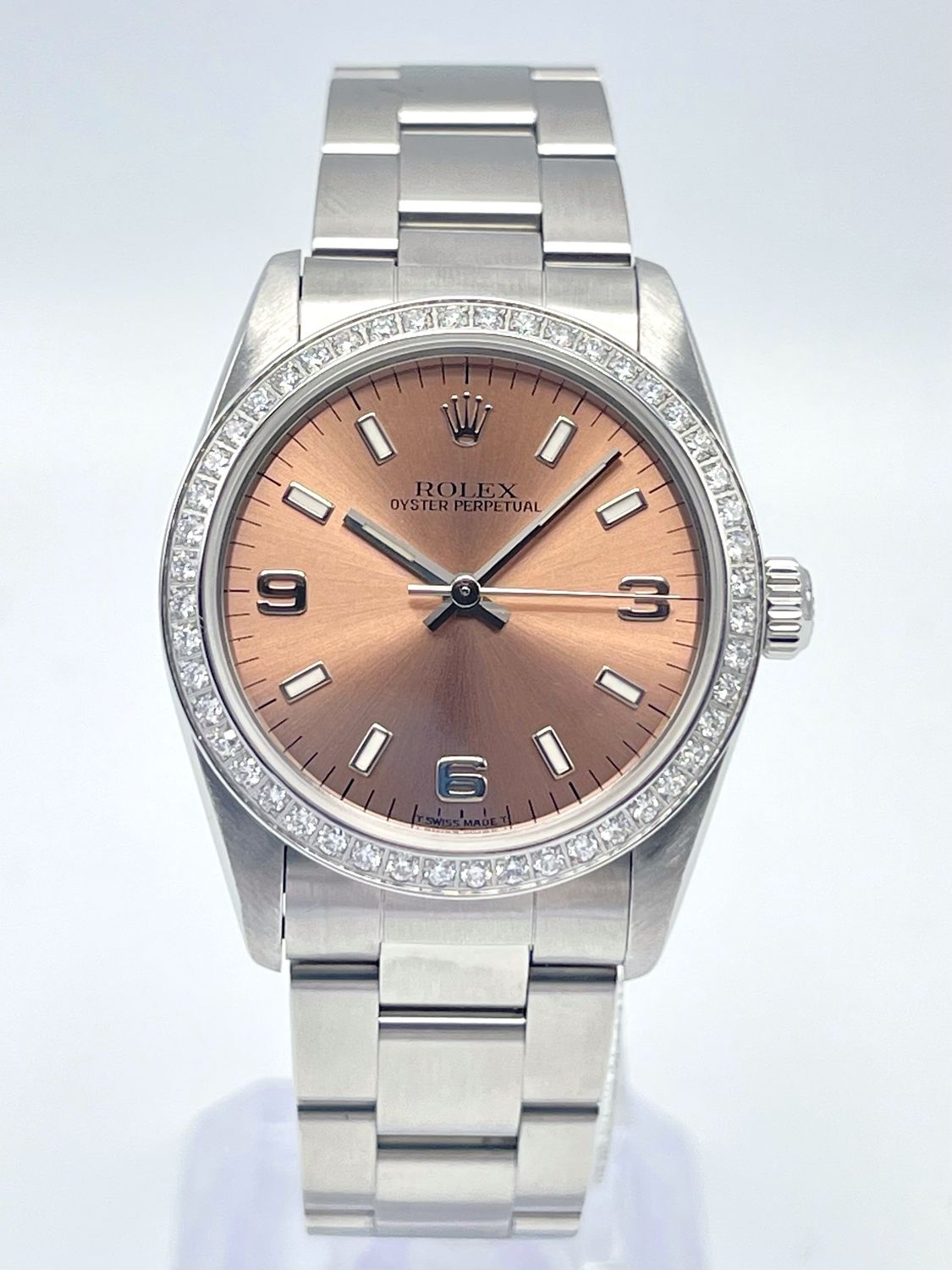 Rolex Oyster Perpetual 31mm 67480 Salmon Bronze Dial Diamond Bezel Oyster Box