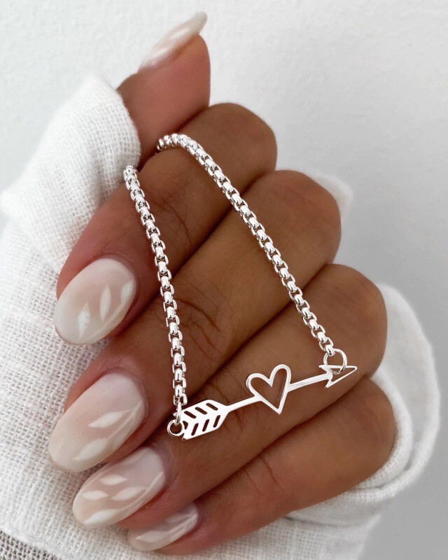 Conjunto corazón flechado