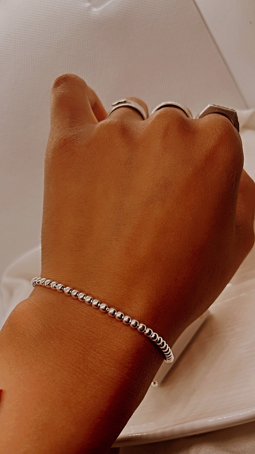 Pulsera corbatín esferitas
