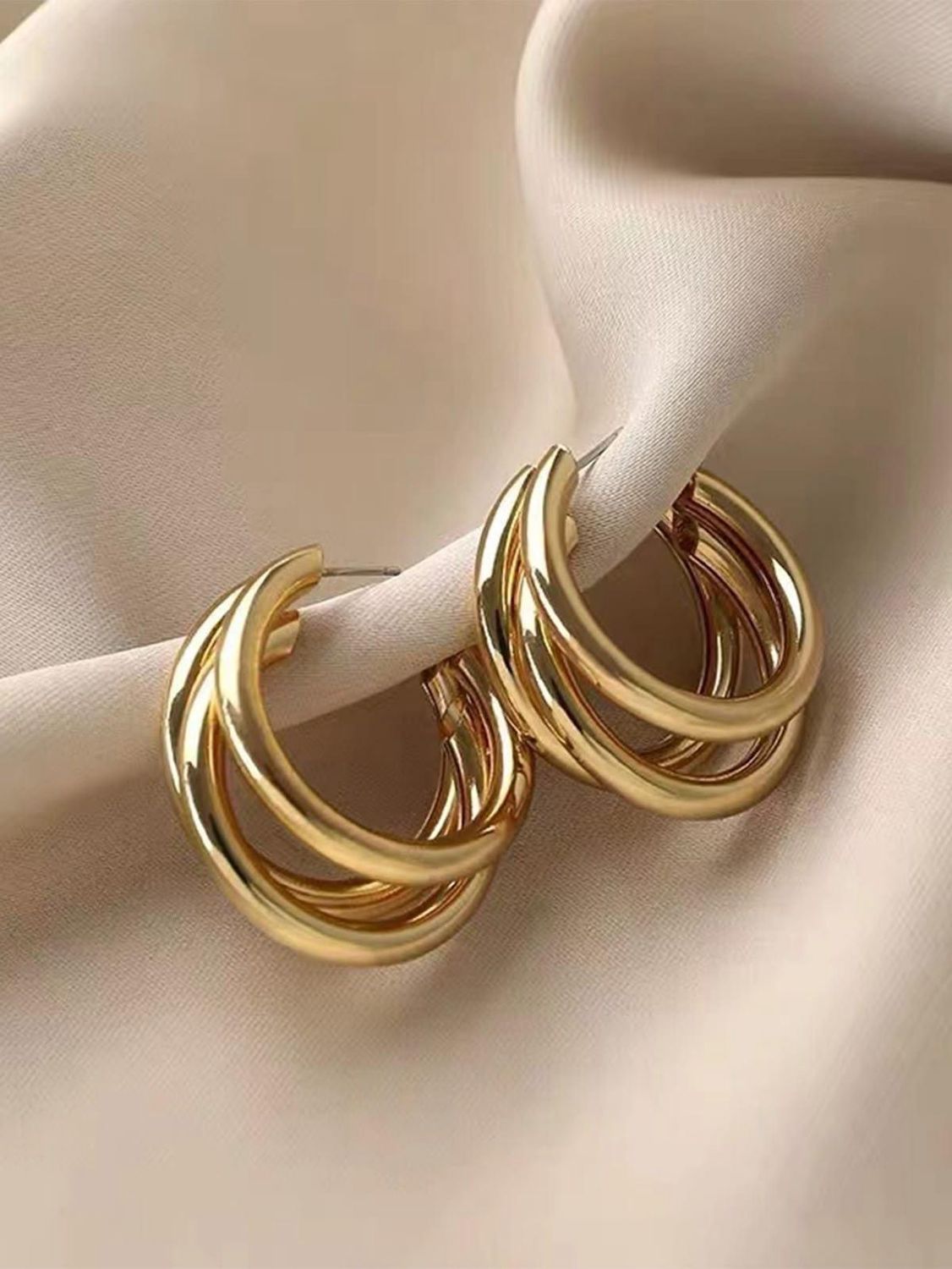 Aros triples acero dorado
