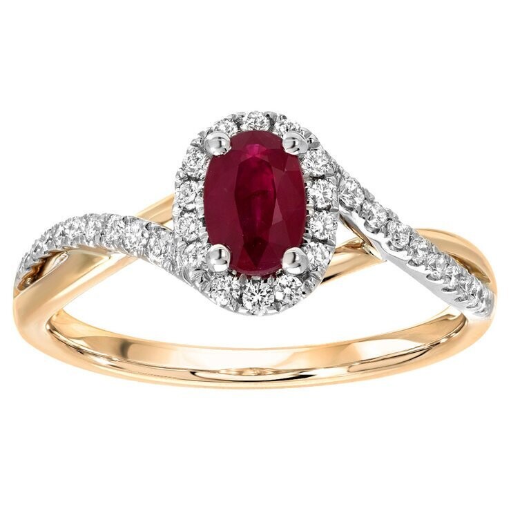 Oval Cut Ruby and 0.20ctw Diamond Ring, 14ct White and Yellow Gold Oval Cut Ruby and 0.20ctw Diamond Ring, 14ct White and Yellow Gold