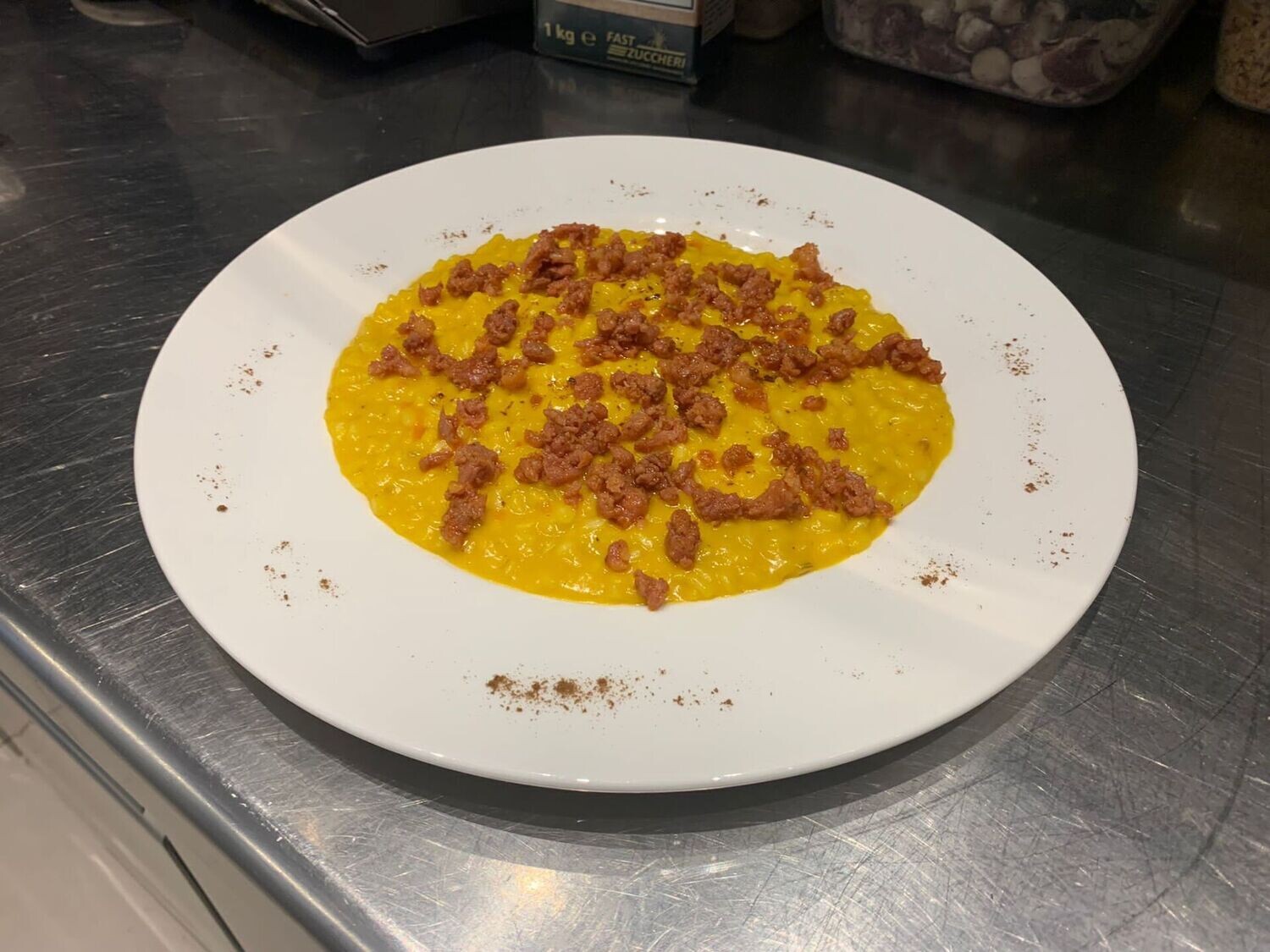 Risotto Carnaroli classico Tenuta Castello Mantecato con zucca, pasta di salame lucano Crusco di Senise e sentori di liquirizia