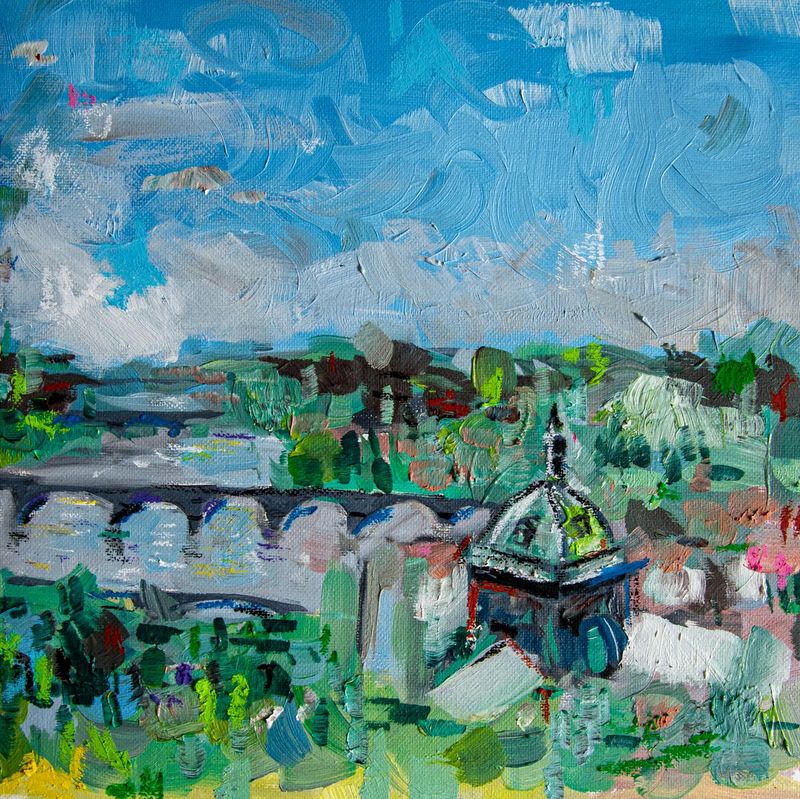 Prague skyline with dome of St. Francis Of Assisi Church and Charles Bridge