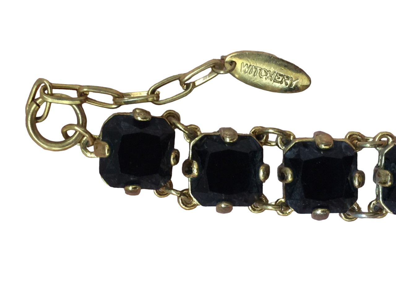 Chunky Witchery gold tone black glass bracelet
