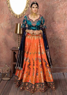 Delightful Outstanding Banarasi Silk Wedding Orange Lehenga Choli