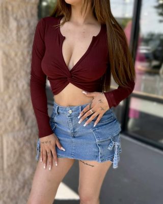 Showing off long sleeve tie top
