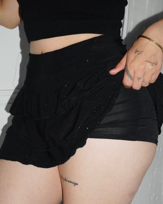 Front row glitter mini skirt