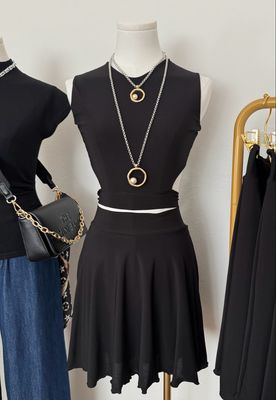 Black Cut Out Top & Skort Set By Pía