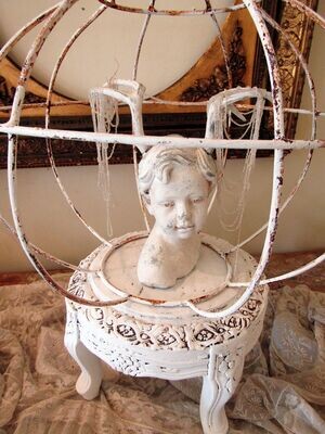 Boy with antlers sculpture with base and dome Boy with antlers sculpture with base and dome