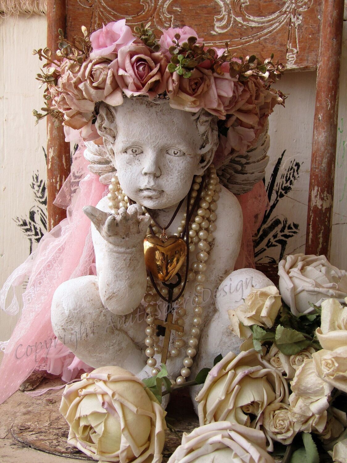 Cherub statue with pink rose halo crown by Anita Spero