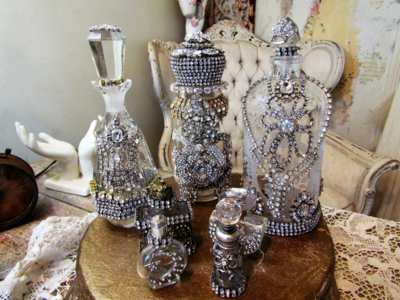 Set of 7 altered rhinestone embellished bottles by Anita Spero Design