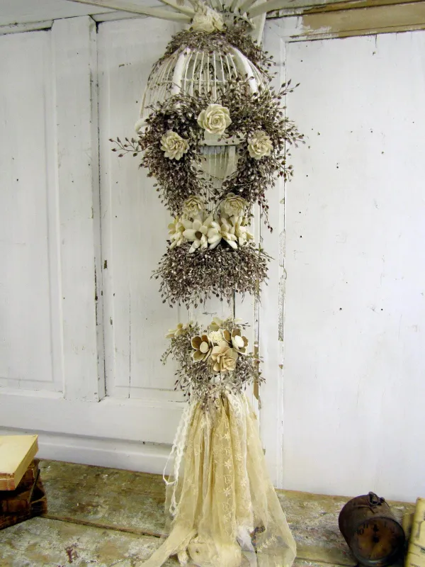 Large white ivory hot air balloon birdcage hanging wood and wire decor embellished in wooden flowers&#39; mini Luna leaves  anita spero design